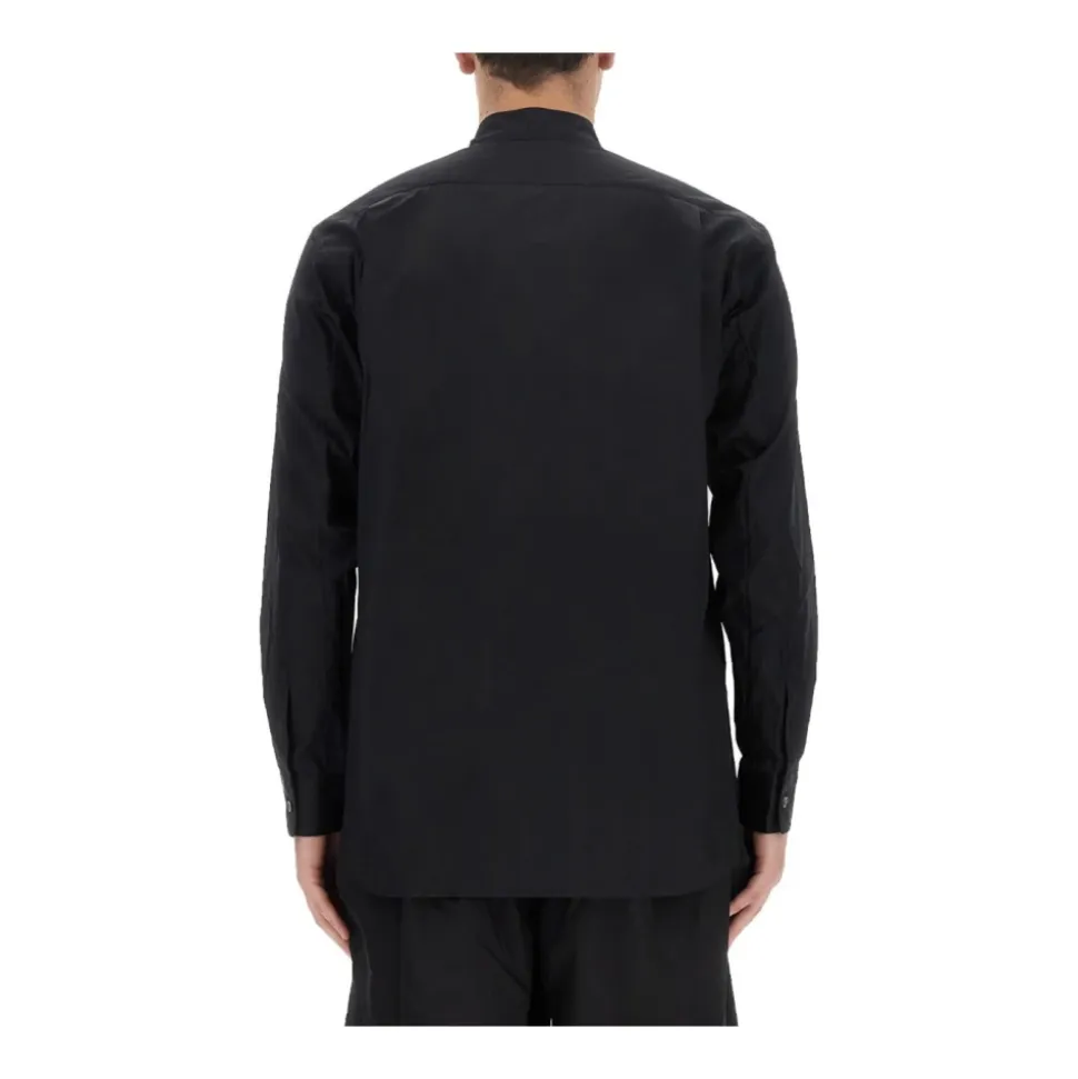 Chemise en coton plissé à franges