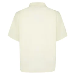 Chemise en tissu écru. Courte