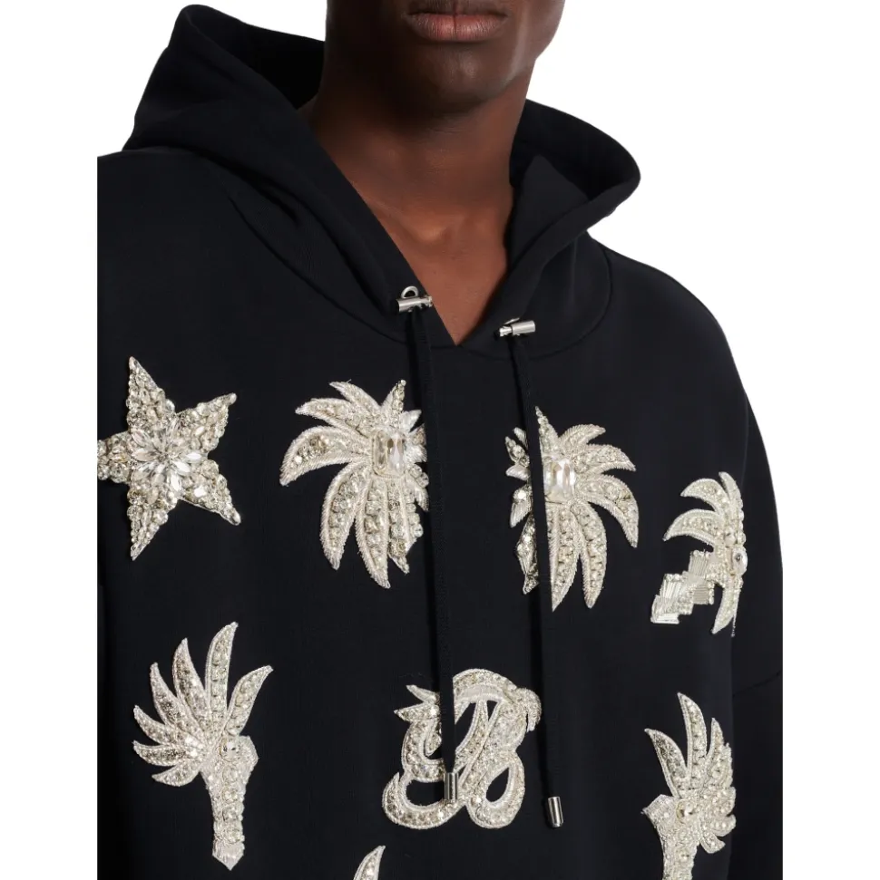 Hoodie with embroidered badges