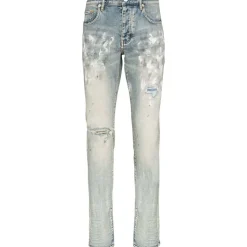 Jeans slim fit peints en blanc