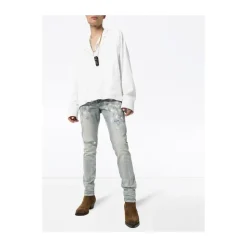 Jeans slim fit peints en blanc