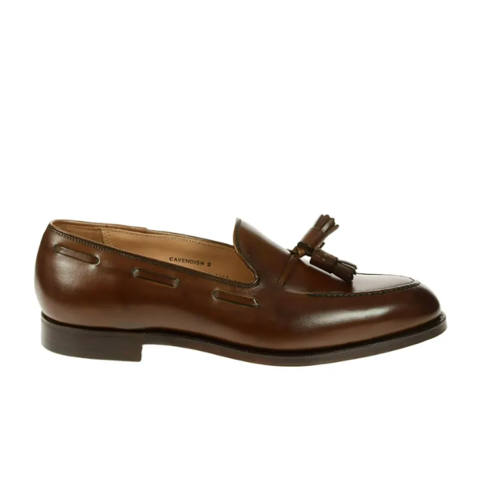 Mocassins en cuir marron avec détail pompon