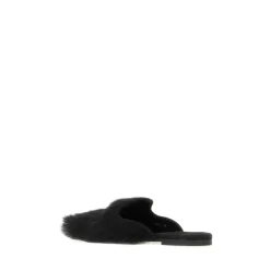 Mules en shearling et daim