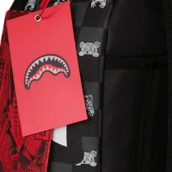 Sac à dos à motif vérifié avec personnage qui dépasse